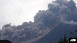 The Fuego Volcano in eruption, seen from Alotenango municipality, Sacatepequez department, about 65 km southwest of Guatemala City, on June 3, 2018.