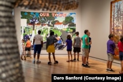 School children look at art at the Crystal bridges Museum of American Art, Bentonville, Arkansas