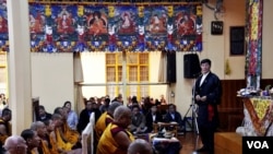Prime Minister of the Tibetan Administration in Dharamsala speaking during the prayer session
