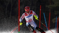 FILE - Tyler Carter of the U.S. races in the Pyeongchang 2018 Winter Paralympics at Jeongseon Alpine Centre, Jeongseon, South Korea, March 17, 2018.