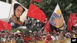 Venezuelans rally along a Caracas street