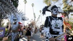 Performers in the 2009 Day of the Dead procession at the Hollywood Forever cemetery in Los Angeles, California