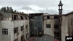Une vue de l'hôtel après un incendie a fait au moins 19 morts à Harbin, dans la province du Heilongjiang, en Chine, le 25 août 2018.