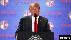 U.S. President Donald Trump speaks during a news conference after his meeting with North Korean leader Kim Jong Un. June 12, 2018.