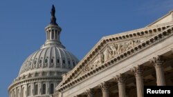 FILE - The U.S. Congress Capitol Dome, left, is pictured in Washington, D.C., Oct. 4, 2013.