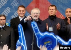 Vladimir Zhirinovsky, center, head of the Liberal Democratic Party of Russia, delivers a campaign speech ahead of parliamentary elections in Moscow, Sept. 15, 2016.