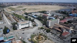 This photo taken July 11, 2011 shows an overview of Boeung Kak, Phnom Penh's largest lake full of sand where thousands of residents in the area face eviction. The World Bank on Tuesday, Aug. 9, 2011, suspended further loans to Cambodia until its governmen