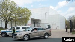FILE - A sheriff's car leaves Paisley Park, U.S. music superstar Prince's estate in Chanhassen, Minn., April 21, 2016. The administrator of Prince's estate says it is not planning to sell Paisley Park, one day after asking a judge for permission to offer 