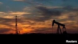 FILE - Rigging equipment is pictured in a field outside of Sweetwater, Texas, June 4, 2015.