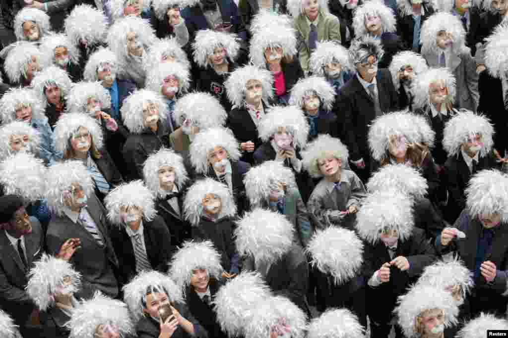 Some of the 404 participants pose for a photo during the "Next Einstein" competition, which set a Guinness World Record for the "largest gathering of people dressed as Albert Einstein," in Toronto, Canada, March 28, 2017. According to organizers of the Einstein Legacy Project, the aim is to encourage innovation and free-thinking. (Courtesy of Canadian Friends of the Hebrew University)