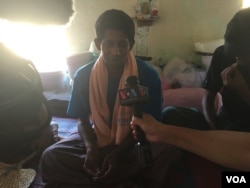 Mahmoud speaks to VOA in a detention camp near Taung Pyo, Myanmar. (Colin Lovett/VOA News)