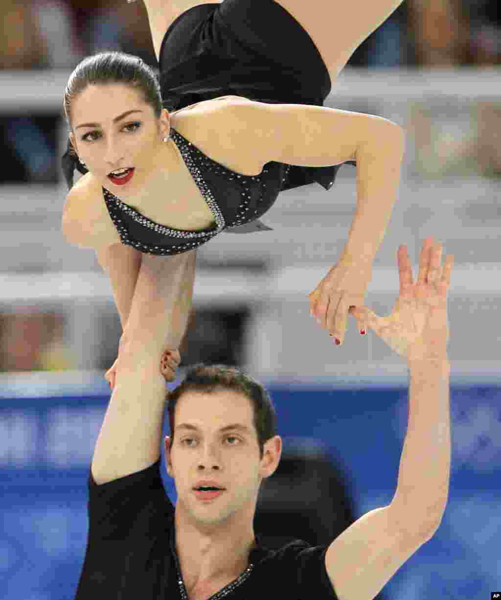 Marissa Castelli e Simon Shnapir dos Estados Unidos. Jogos Olímpicos de Inverno, Sochi, Fev. 11, 2014, Rússia