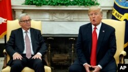 FILE - President Donald Trump and European Commission president Jean-Claude Juncker discussed working together on trade in the Oval Office of the White House, Wednesday, July 25, 2018, in Washington. (AP Photo/Evan Vucci)