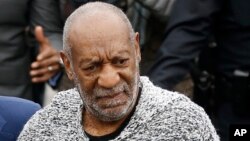 FILE - Bill Cosby arrives at court to face a felony charge of aggravated indecent assault, Dec. 30, 2015.