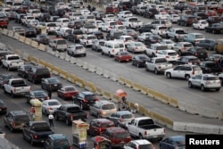 Cars wait to cross at San Ysidro border crossing between the U.S. and Mexico, in Tijuana, Mexico, May 6, 2019.