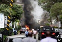Fire and smoke rises from an explosion in Nairobi, Kenya, Jan. 15, 2019.