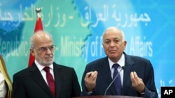 Министр иностранных дел Ирака Ибрагим Джаафари и Генеральный секретарь Лиги арабских государств Набиль Эль-Араби 