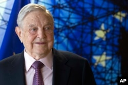 FILE - This is a April 27, 2017, photo of George Soros, Founder and Chairman of the Open Society Foundation, as he waits for the start of a meeting at EU headquarters in Brussels.