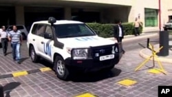 Image taken from AP Television shows a UN vehicle leaving the Four Seasons Hotel in Damascus, Syria, Aug. 27, 2013. 