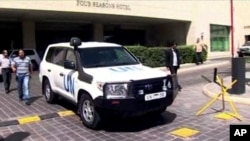 Image shows a U.N. vehicle leaving the Four Seasons Hotel in Damascus, Syria, Aug. 27, 2013. 