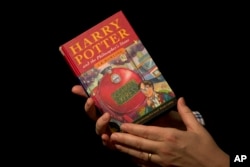 An original copy of "Harry Potter and the Philosopher's Stone."