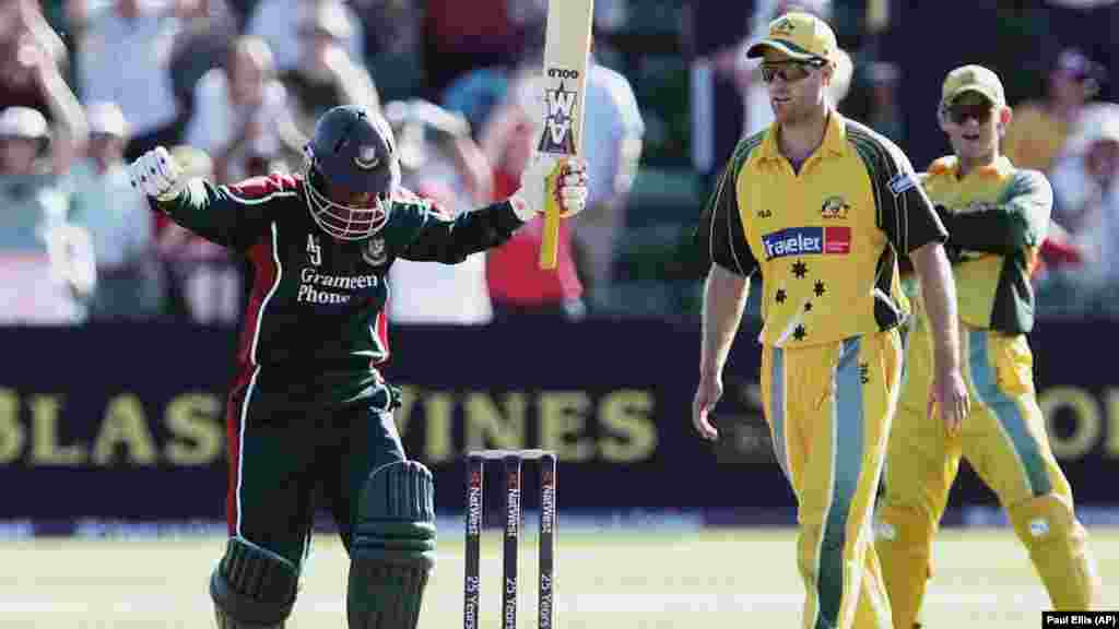 Bangladesh&#39;s Mohammed Rafique celebrates beating Australia during their One Day Cricket Test at Sophia Gardens, Cardiff, Wales, Saturday June 18, 2005. The victory by Bangladesh is seen as one of the biggest upsets ever in cricket.