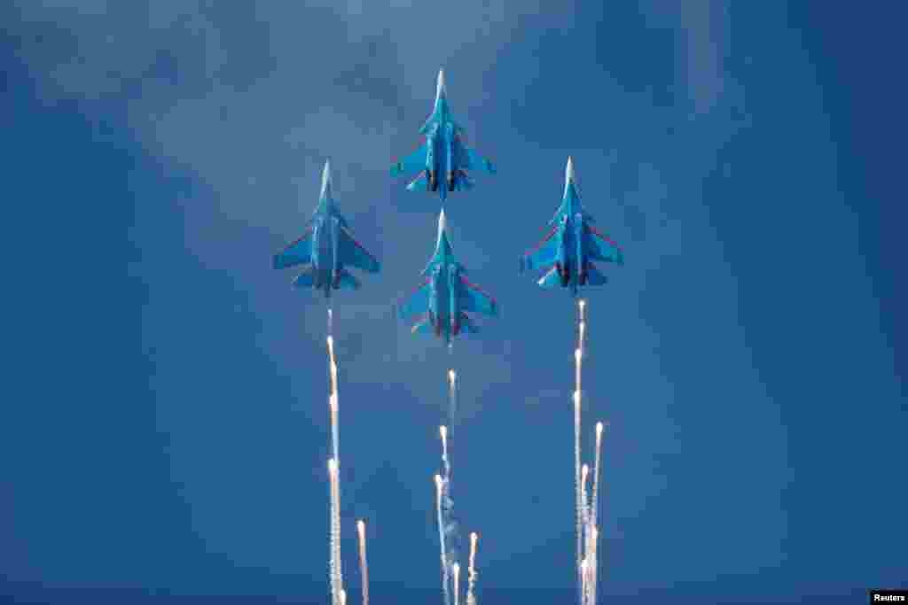 Jets of the Russian Knights aerobatic team perform at an air show to mark the 80th anniversary of the victory in the Battle of Khalkhin Gol, in Ulaanbaatar, Mongolia.