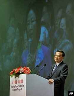 中国国务院副总理李克强在香港出席「十二五」规划论坛