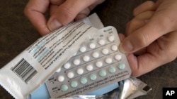 FILE - A one-month dosage of hormonal birth control pills is displayed Aug. 26, 2016, in Sacramento, Calif.