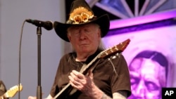 Johnny Winter performs at the 2014 New Orleans Jazz & Heritage Festival at Fair Grounds Race Course in New Orleans, May 3, 2014.