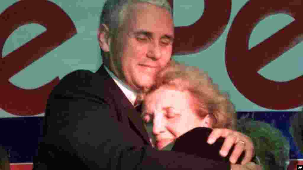 Republican candidate Mike Pence, left, hugs his mother Nancy Pence following his victory speech in Anderson, Indiana, Nov. 7, 2000. Pence defeated Democrat Bob Rock for the seat in Indiana&#39;s 2nd Congressional District.