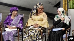 Nobel Peace Prize winners Liberian president Ellen Johnson-Sirleaf, left, Liberian peace activist Leymah Gbowee, center, and Tawakkol Karman of Yemen, right, take the stage at City Hall in in Oslo, Norway, December 10, 2011.