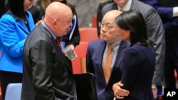 United Nations Ambassadors Vasily Nebenzya of Russia, left, Liu Jieyi of China, center, and Nikki Haley of the U.S., right, confer after the United Nations nonproliferation meeting on North Korea, Sept. 4, 2017 at U.N. headquarters.