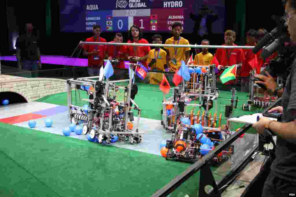 A robot from the Cambodian youth team competes with robots from other teams during the First Global Challenge robotics competition in Washington, DC, Monday, July 17, 2017. (Nem Sopheakpanha/VOA Khmer)