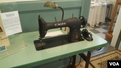 Singer was a popular brand of sewing machine when people sewed their own clothing (F.El Masry/VOA)