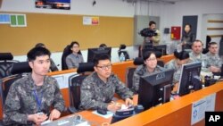 A commanding post for war games shows U.S. and South Korean soldiers working together in a U.S. military camp in Seoul, South Korea, March 15, 2013.