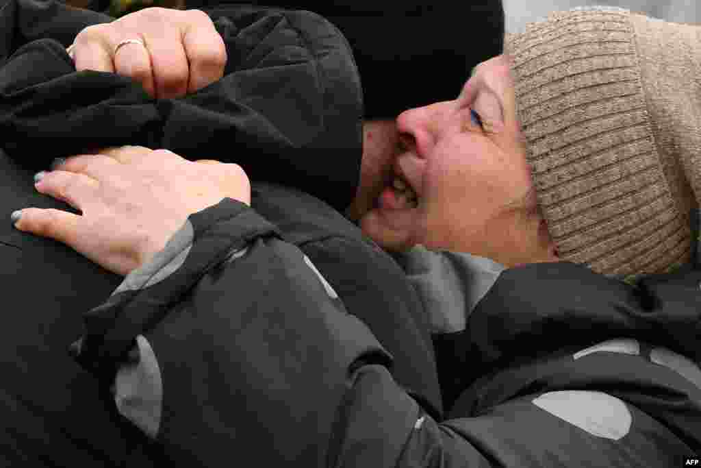 Ukrainian Ivan Katyshev is embraced by his mother Lyudmila after being released during a prisoner exchange between Ukraine and pro-Russian rebels near the Mayorsk checkpoint in Odradivka, Ukraine.