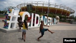 Children play soccer at the Olympic park which was used for the Rio 2016 Olympic Games, in Rio de Janeiro, Brazil, Feb. 5, 2017. 