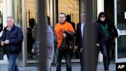 José Ignacio de Juana Chaos, centre, a convicted former ETA terrorist leaves a court in Belfast, Northern Ireland 