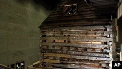 Smithsonian African American Museum: In this photo taken July 18, 2016, a slave cabin from Poolesville, Md., is on display in the Smithsonian National Museum of African American History and Culture in Washington, as seen during a media preview tour. The m
