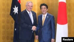 Thủ tướng Úc Scott Morrison (trái) và Thủ tướng Nhật Shinzo Abe.