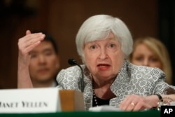 FILE - Federal Reserve Chair Janet Yellen testifies on Capitol Hill in Washington, July 13, 2017, before the Senate Banking Committee.