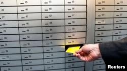 Safe deposit boxes are pictured in a bank in the western Austrian city of Hall in Tirol, April 8, 2013. 