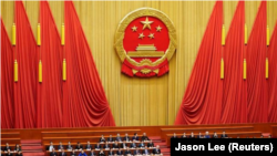 Imagen de la sesión plenaria del Congreso Nacional del Pueblo que votó las enmiendas constitucionales para eliminar el límite en el mandato presidencial el 11 de marzo en Pekín. REUTERS/Jason Lee