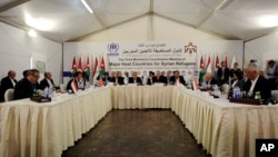 UN High Commissioner for Refugees (UNHCR) Antonio Guterres (C-L) speaks during the third Ministerial Coordination Meeting of Major Host Countries for Syrian Refugees, at Zaatari Refugee Camp in Mafraq, Jordan, May 4, 2014.