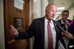 FILE - Rep. Steve King, R-Iowa, talks with a reporter on Capitol Hill in Washington, June 27, 2018.