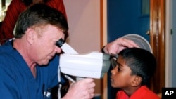 Dr. Jerry Beeve with a patient in Fiji