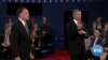 Moderators Hold the Center of Presidential Debate Stage 