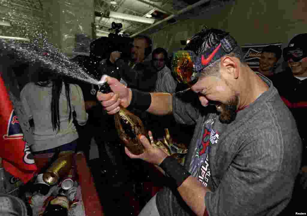 Oct 30, 2013; Boston, MA, USA; Boston Red Sox center fielder Jacoby Ellsbury (right) celebrates with teammates after winning game six of the MLB baseball World Series at Fenway Park. Red Sox won 6-1. Mandatory Credit: Greg M. Cooper-USA TODAY Sports - RTX