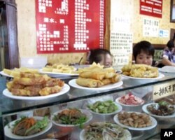 北京的“姚记炒肝店”在拜登副总统访问后顾客爆满，相当走红